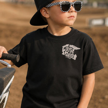 Kid wearing the Fast Kid Crew Dirt Bike Helmet dirt bike t-shirt