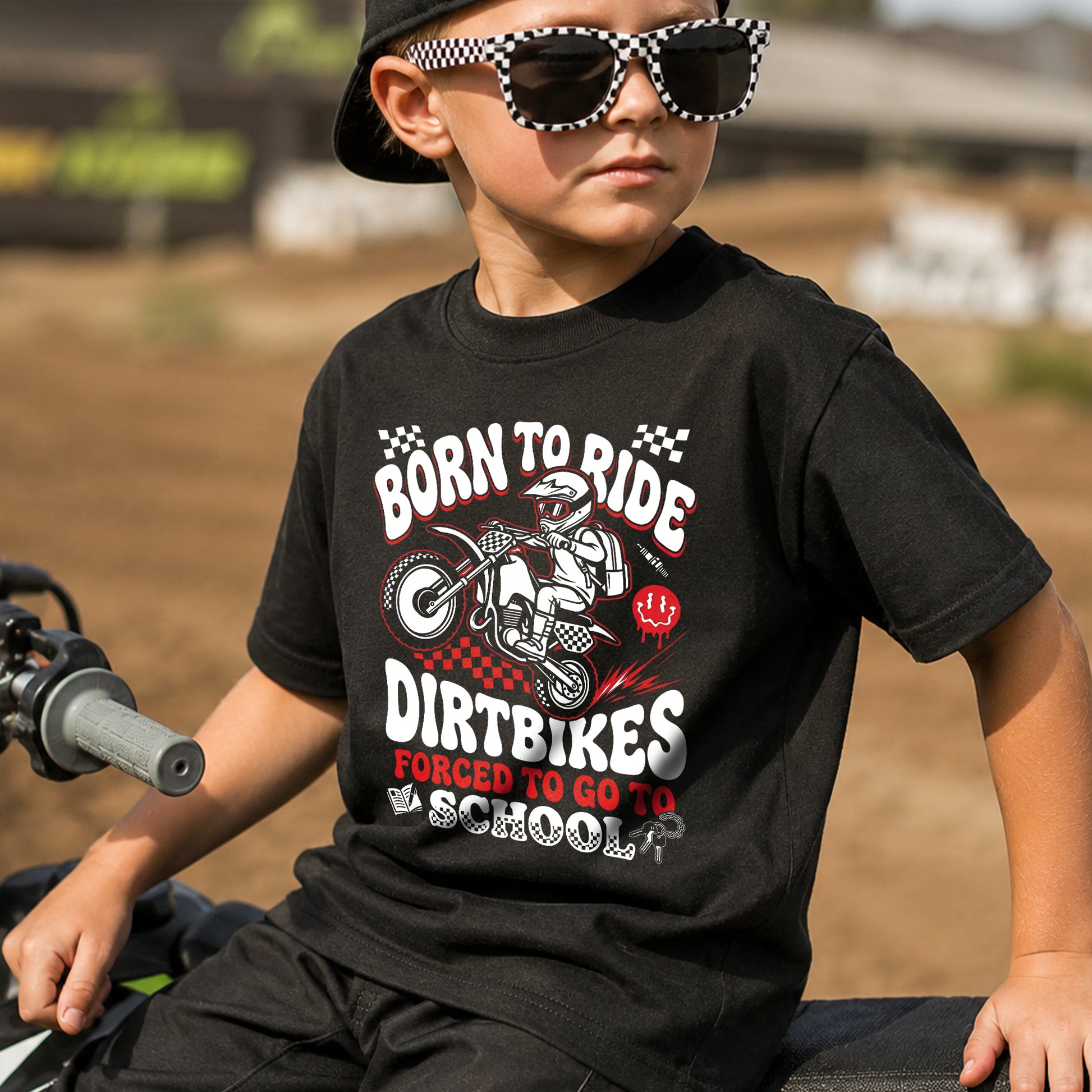 Kid wearing the Born to Ride Dirtbikes, Forced to Go to School dirt bike t-shirt